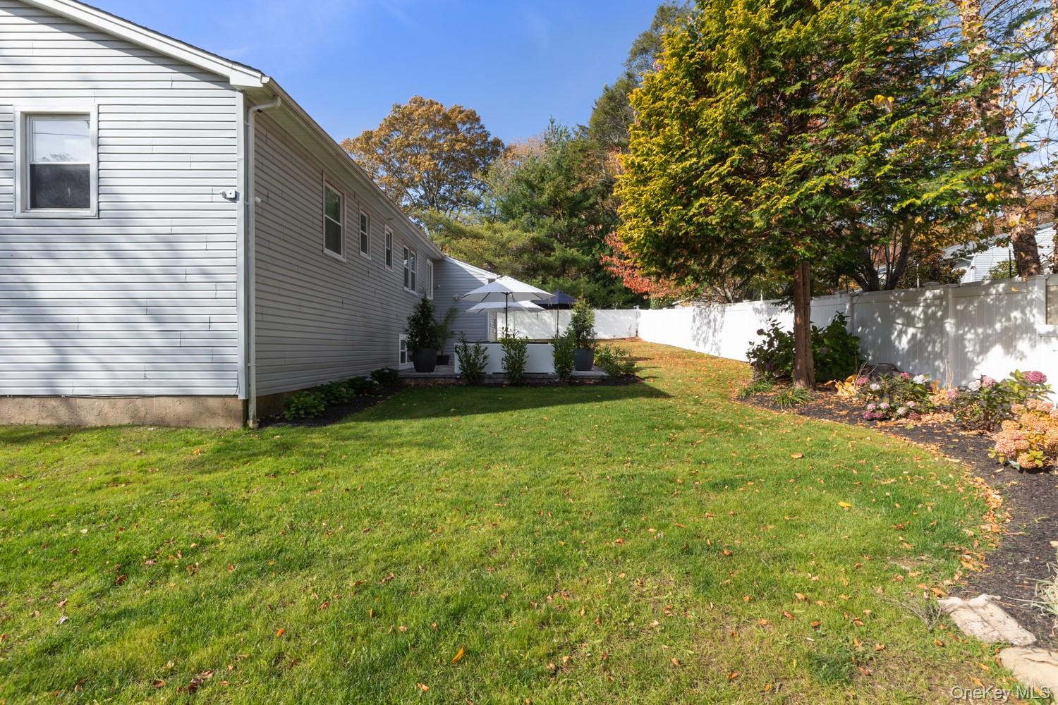 4 Long Ridge Road Plainview, NY 11803 - Photo 24 of 27 a house view with a backyard space