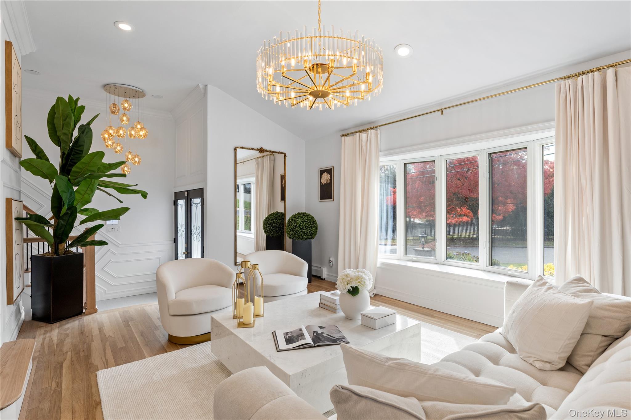 4 Long Ridge Road Plainview, NY 11803 - Photo 3 of 27 a living room with furniture a chandelier and a window