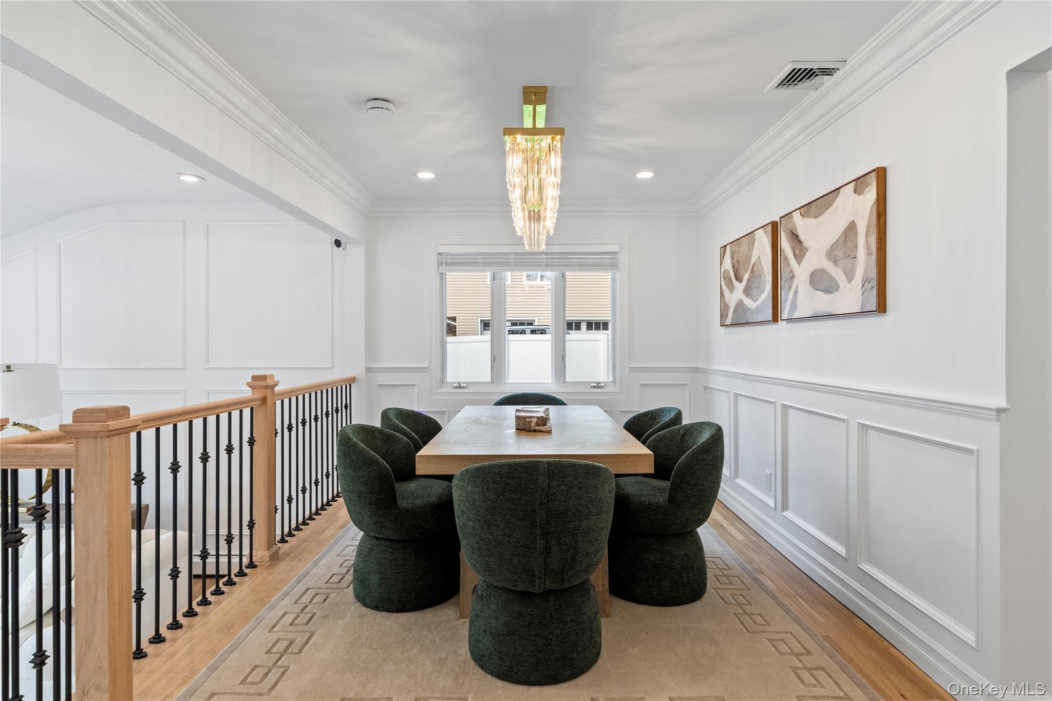 4 Long Ridge Road Plainview, NY 11803 - Photo 7 of 27 a dining room with furniture a window and wooden floor