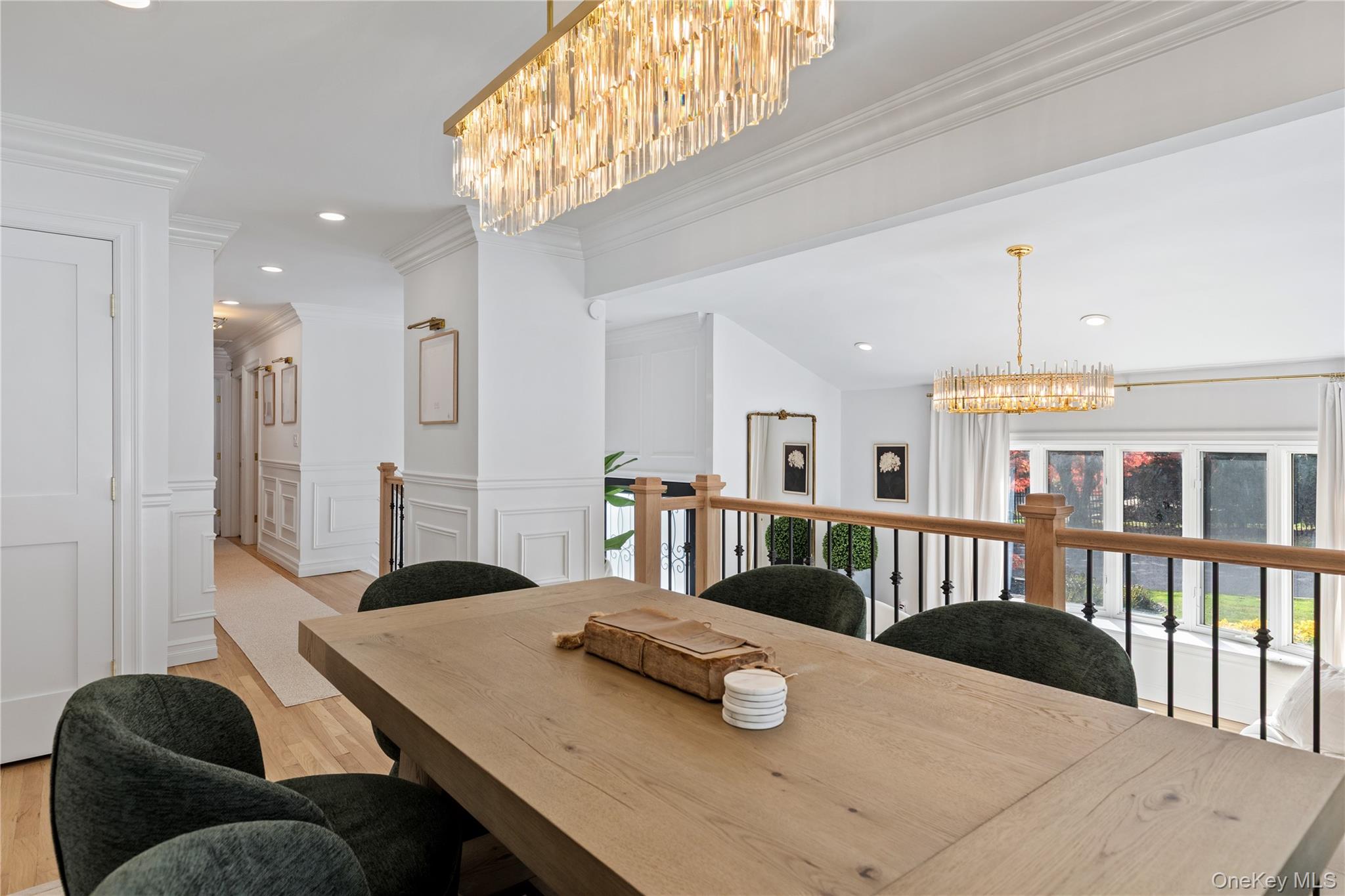 4 Long Ridge Road Plainview, NY 11803 - Photo 8 of 27 a bedroom with furniture and a chandelier