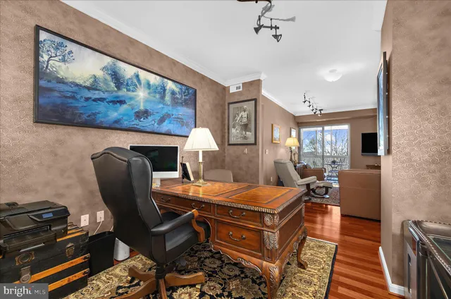 a room with furniture and wooden floor