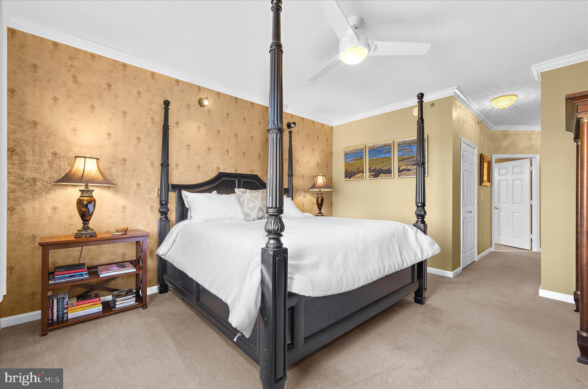 940 Astern Way, Unit 607 Annapolis, MD 21401 - Photo 16 of 45 a bed room with a bed and a lamp