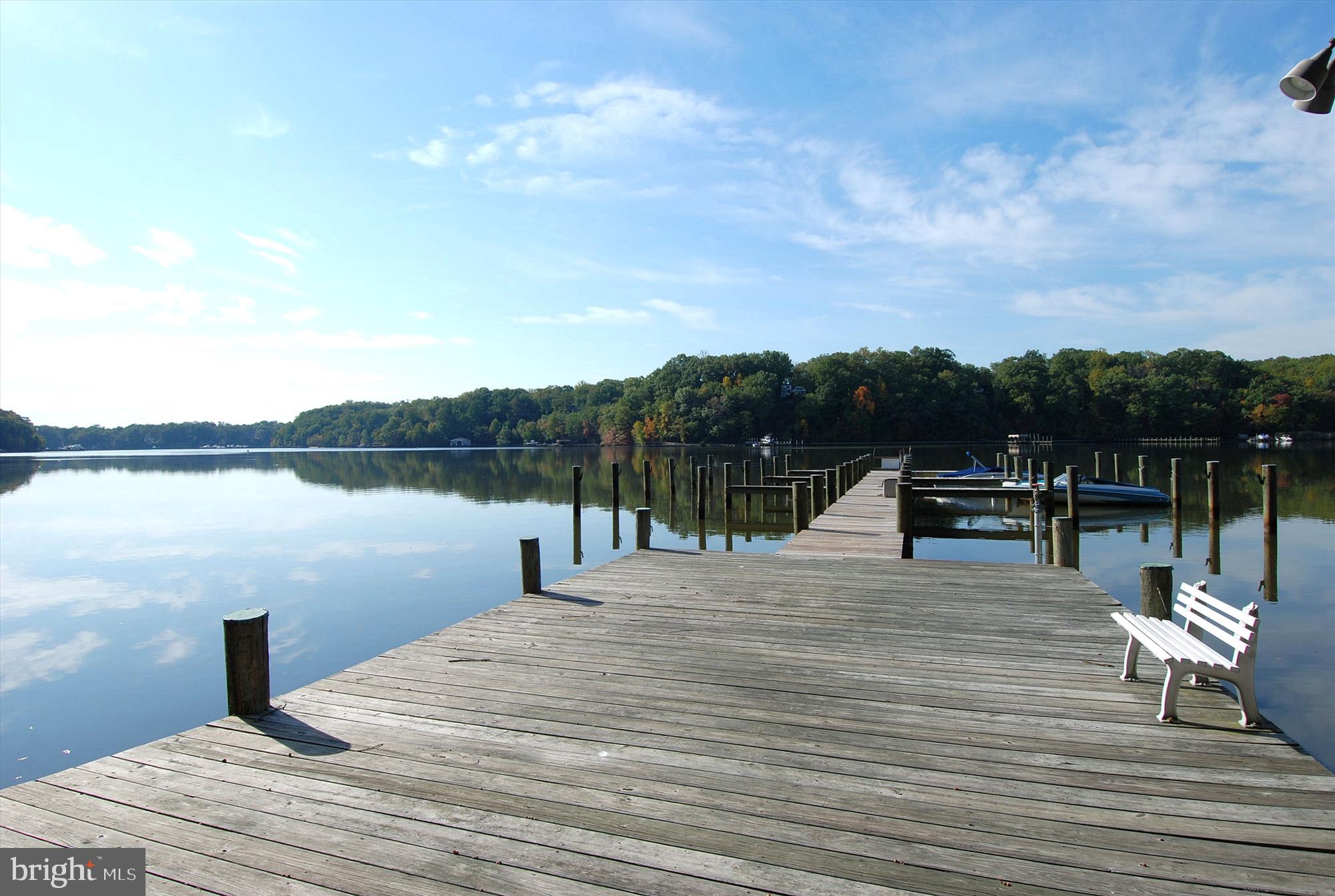 940 Astern Way, Unit 607 Annapolis, MD 21401 - Photo 34 of 45 a view of a lake with chairs