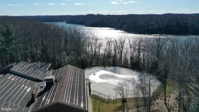 a view of pool with outdoor seating