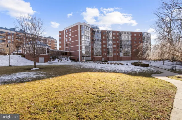 a front view of a building with street view