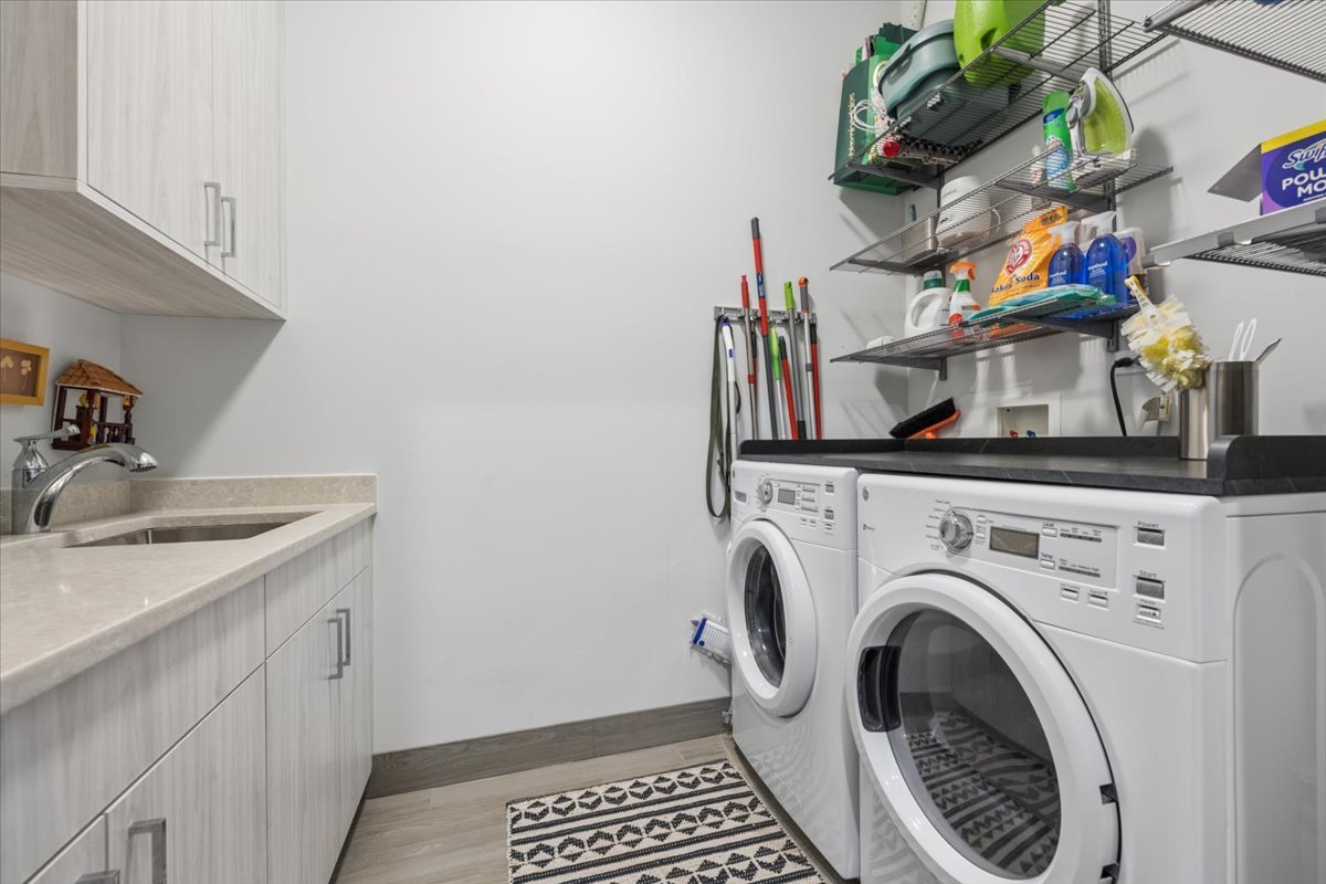 3518 West Wolfram Street, Unit 2 Chicago, IL 60618 - Photo 29 of 34 a utility room with sink dryer and washer