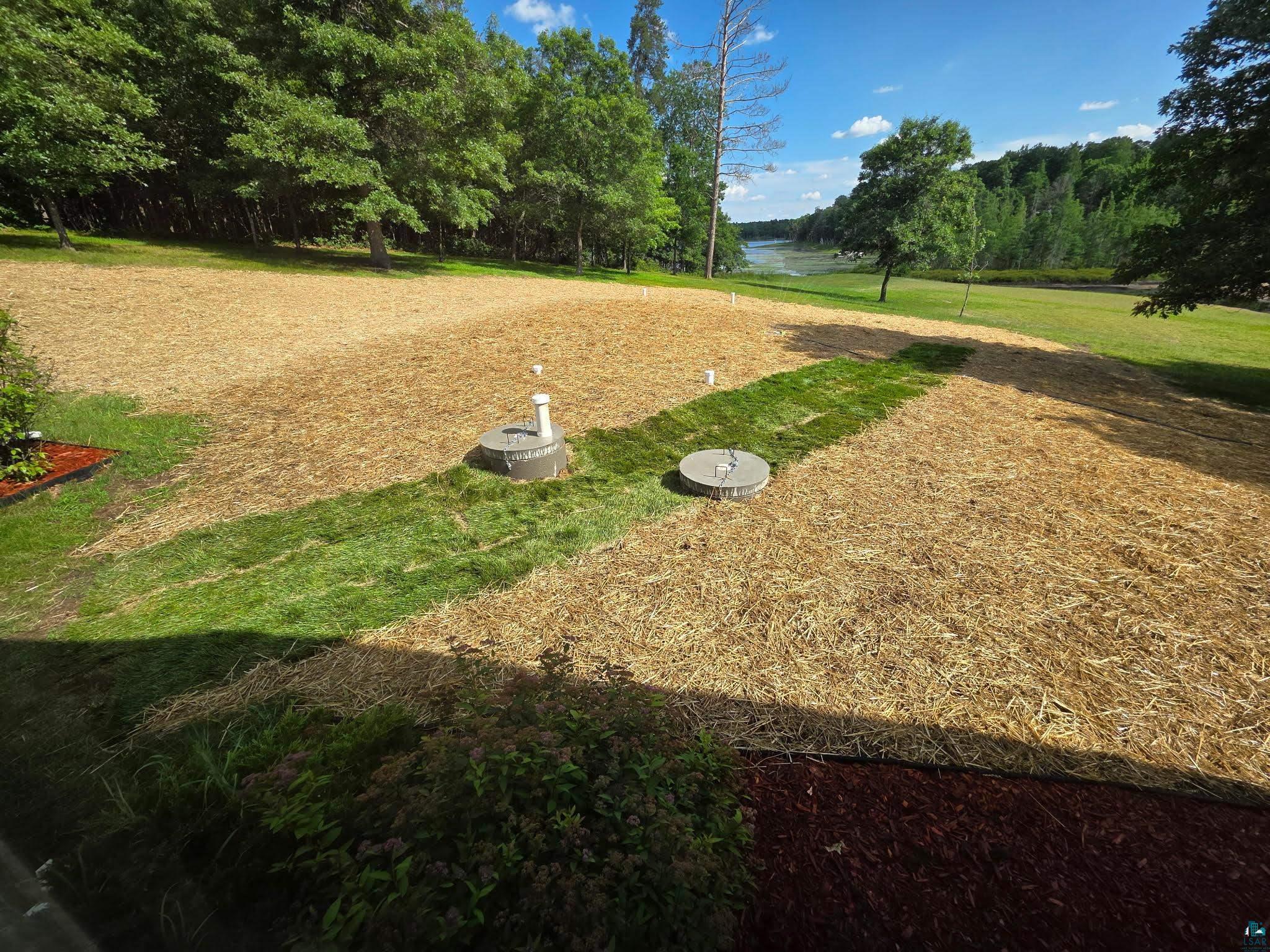 11702 East Mail Road Gordon, WI 54838 - Photo 61 of 61 Recently updated Conventional Septic system in July 2026. Seeded and grass is coming in nicely.