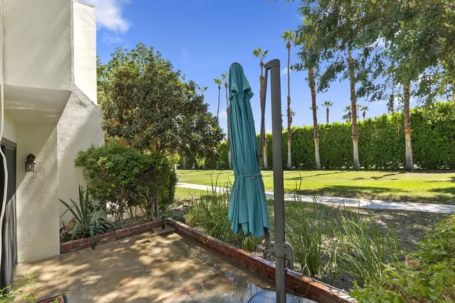 a view of a backyard with garden