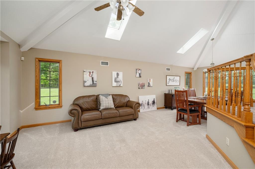 258 Smith Road Renfrew, PA 16053 - Photo 20 of 50 a living room with furniture and a window
