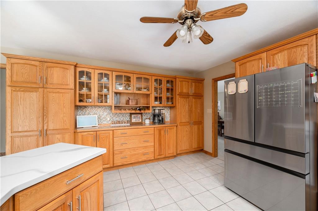 258 Smith Road Renfrew, PA 16053 - Photo 28 of 50 a kitchen with stainless steel appliances granite countertop a refrigerator and a sink
