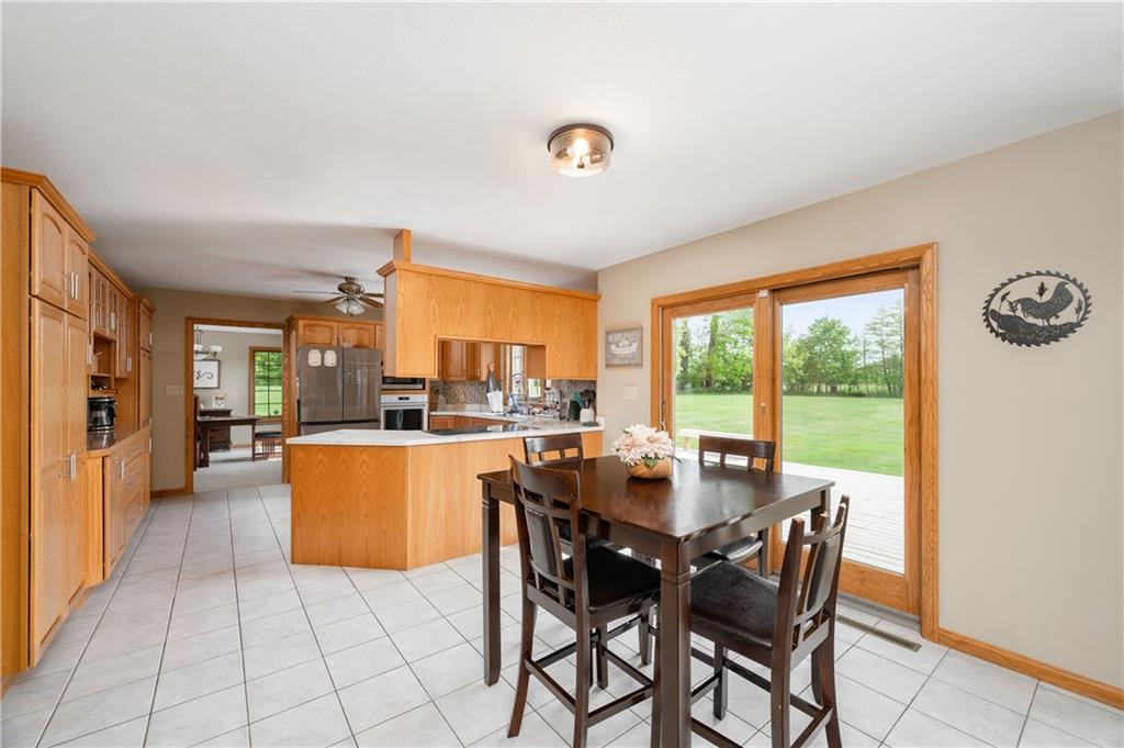 258 Smith Road Renfrew, PA 16053 - Photo 30 of 50 a dining room with furniture and a large window