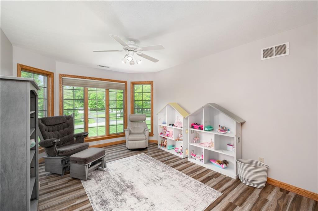 258 Smith Road Renfrew, PA 16053 - Photo 43 of 50 a living room with furniture fireplace and flat screen tv