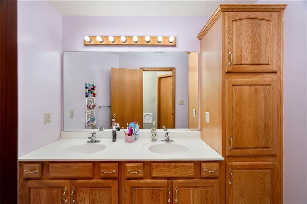 258 Smith Road Renfrew, PA 16053 - Photo 44 of 50 a bathroom with a sink vanity and a mirror