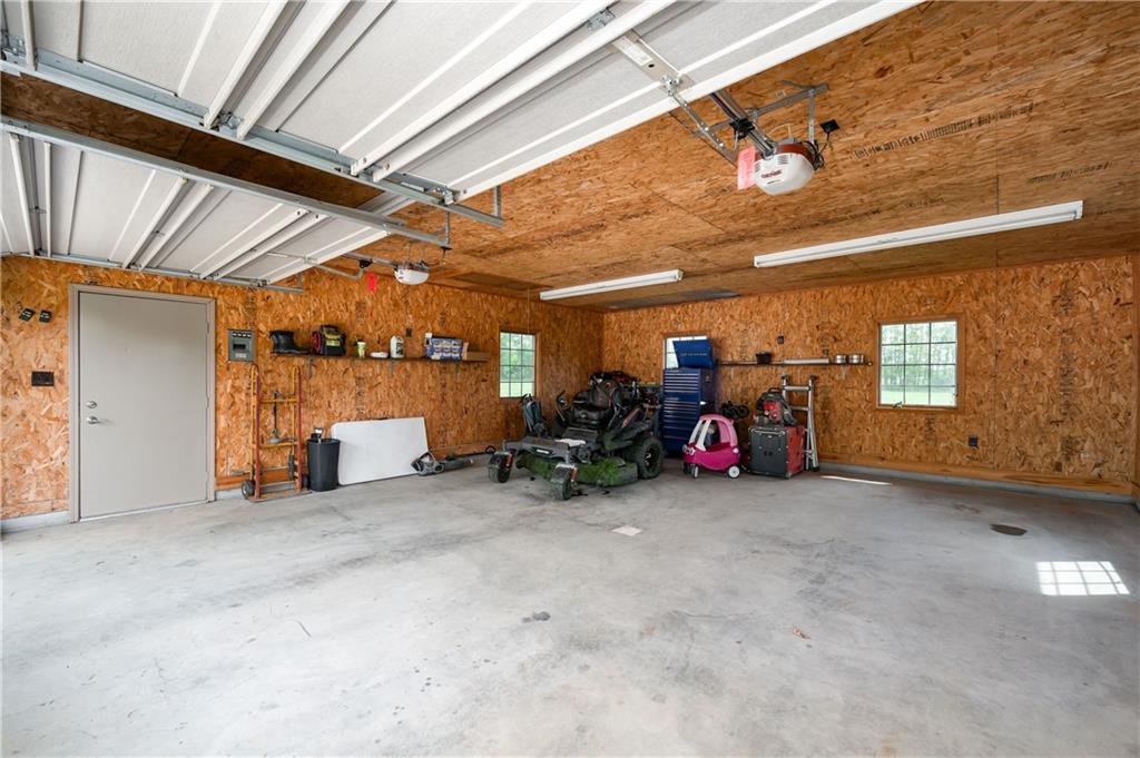 258 Smith Road Renfrew, PA 16053 - Photo 49 of 50 a view of a garage with a table and chairs