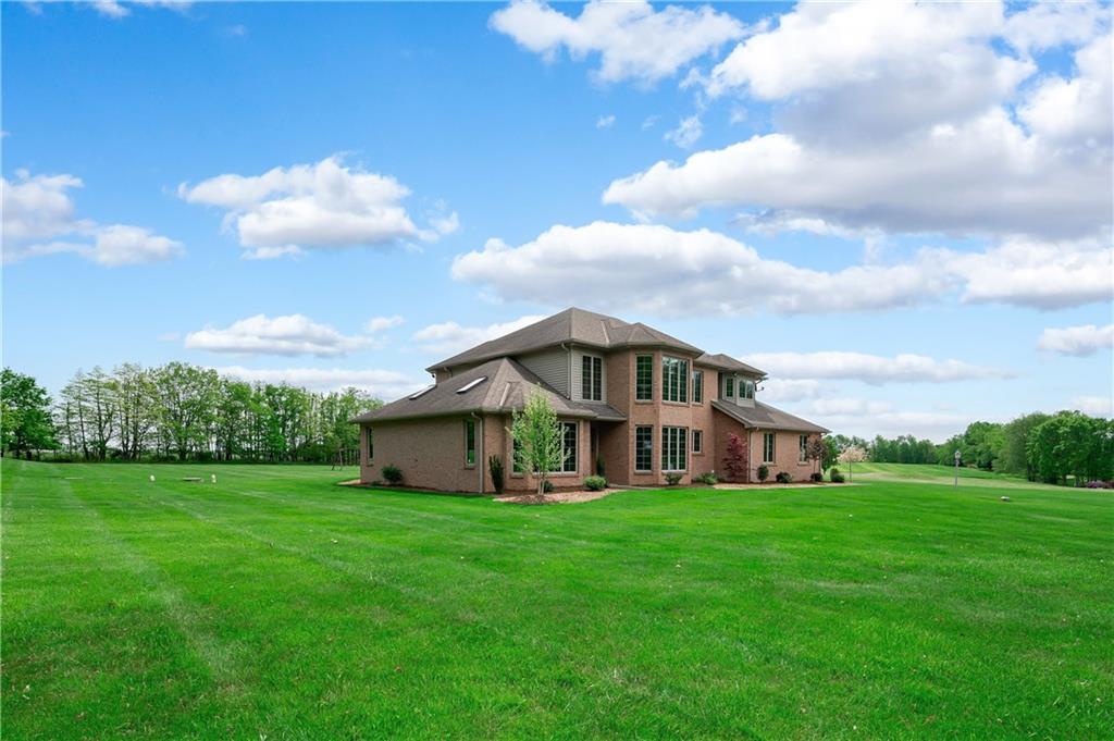258 Smith Road Renfrew, PA 16053 - Photo 50 of 50 a front view of a house with garden