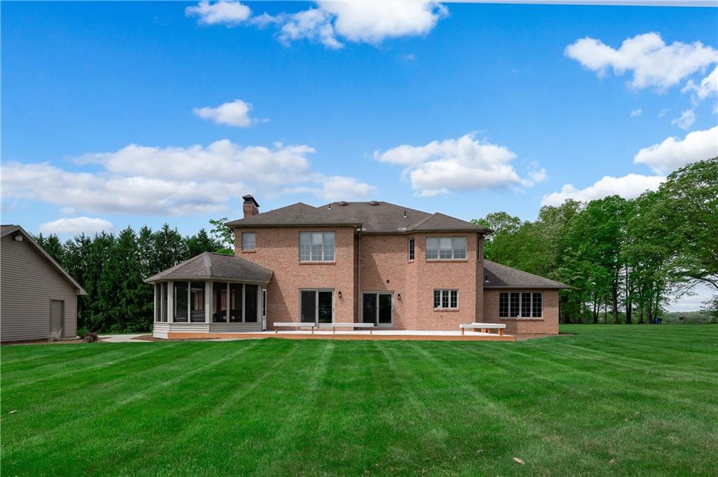 258 Smith Road Renfrew, PA 16053 - Photo 5 of 50 a view of a house with a big yard