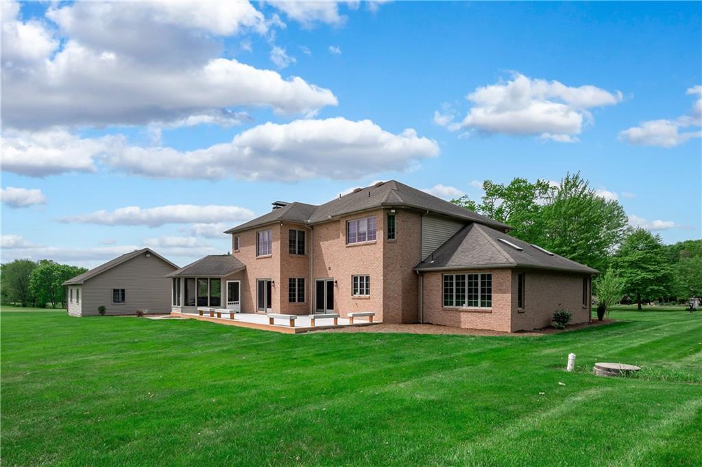 258 Smith Road Renfrew, PA 16053 - Photo 8 of 50 a view of a house with backyard and garden