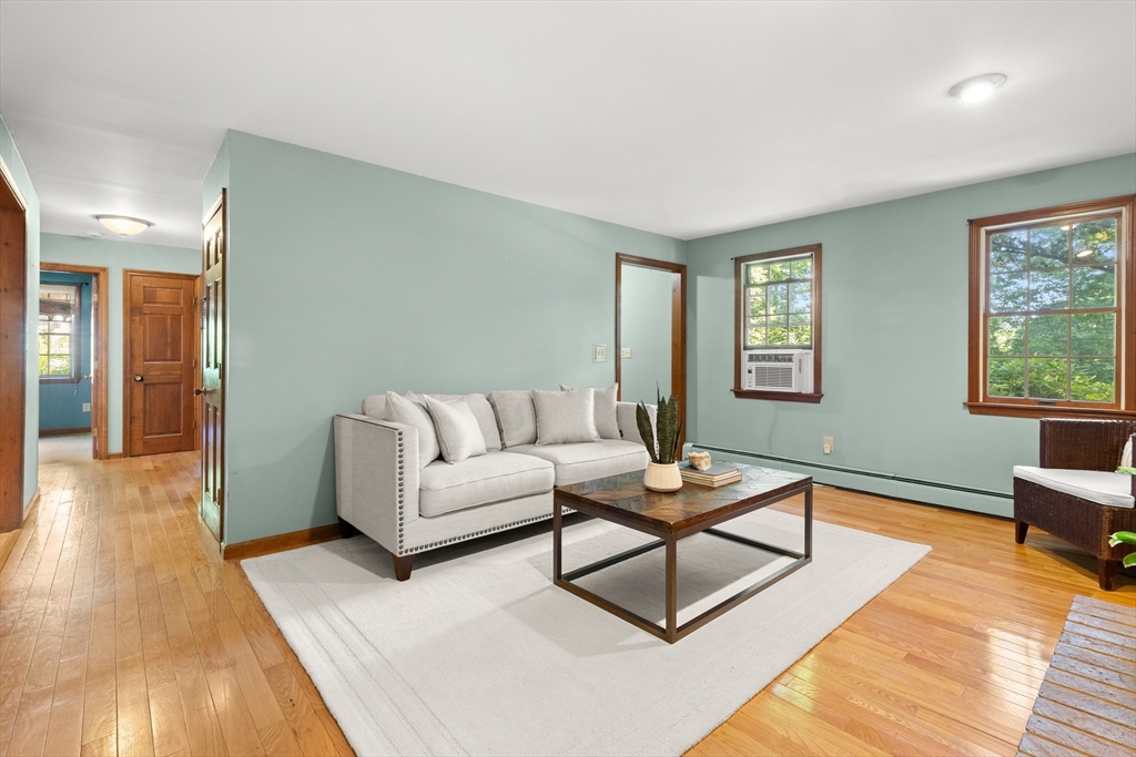31 Kimball Road Amesbury, MA 01913 - Photo 12 of 40 a living room with furniture and a rug