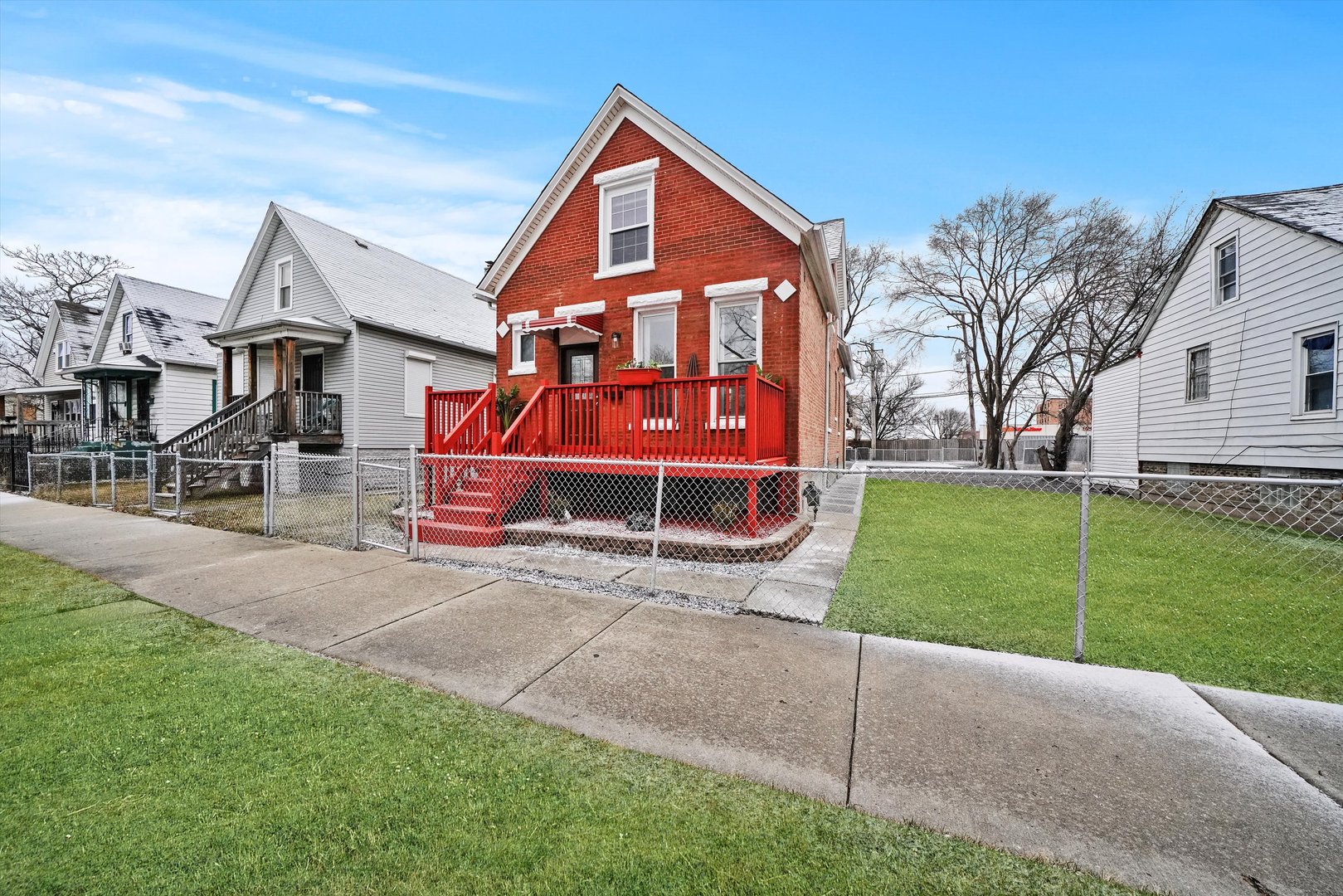 60 East 103rd Place Chicago, IL 60628 - Photo 2 of 20 a view of a house with a yard