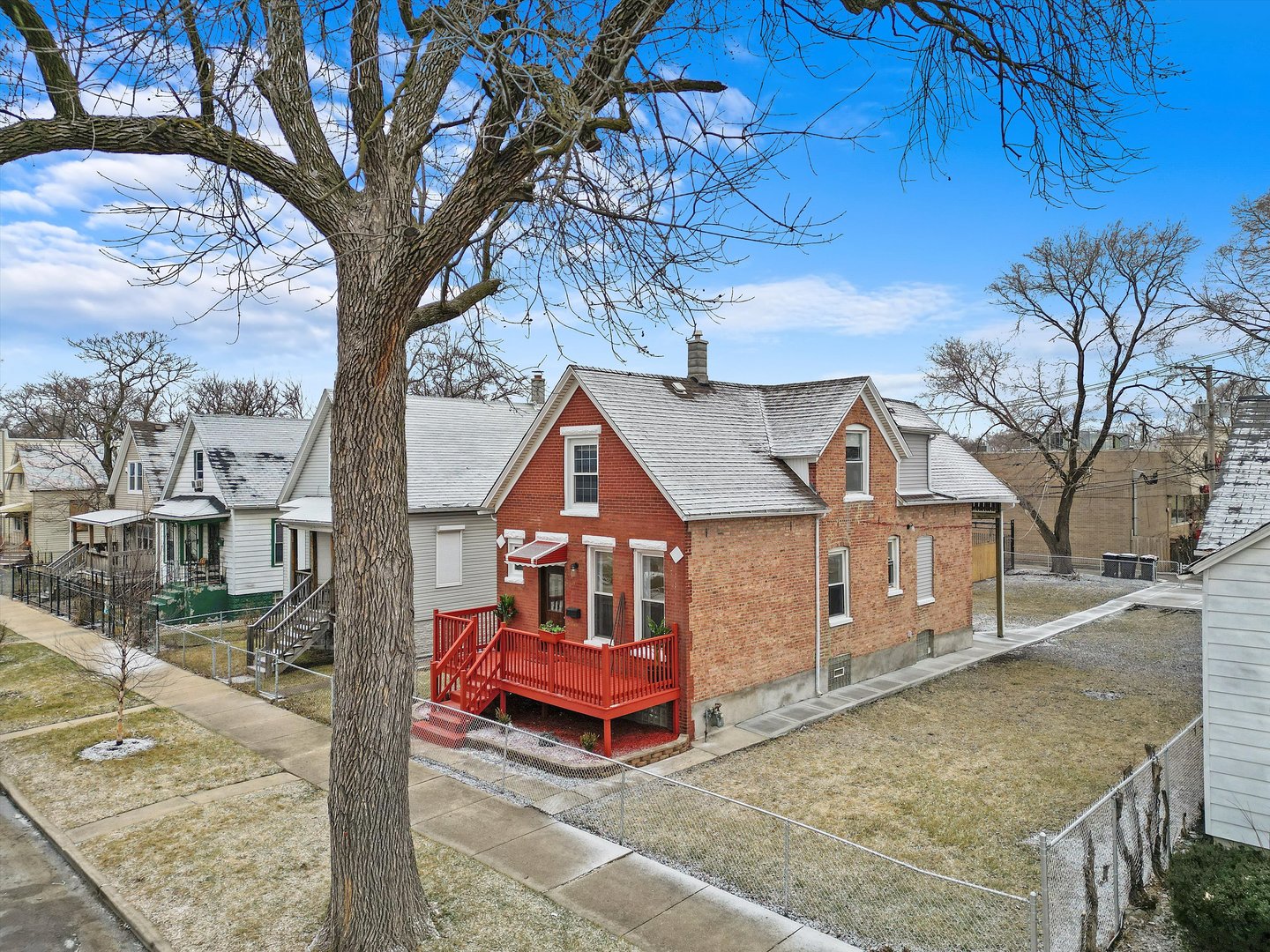 60 East 103rd Place Chicago, IL 60628 - Photo 4 of 20 a view of a house with a yard