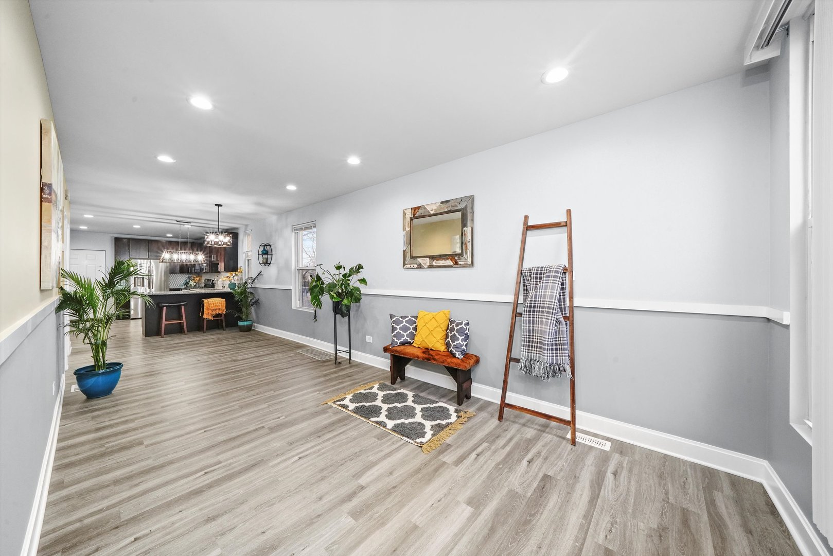 60 East 103rd Place Chicago, IL 60628 - Photo 8 of 20 a living room with furniture and wooden floor