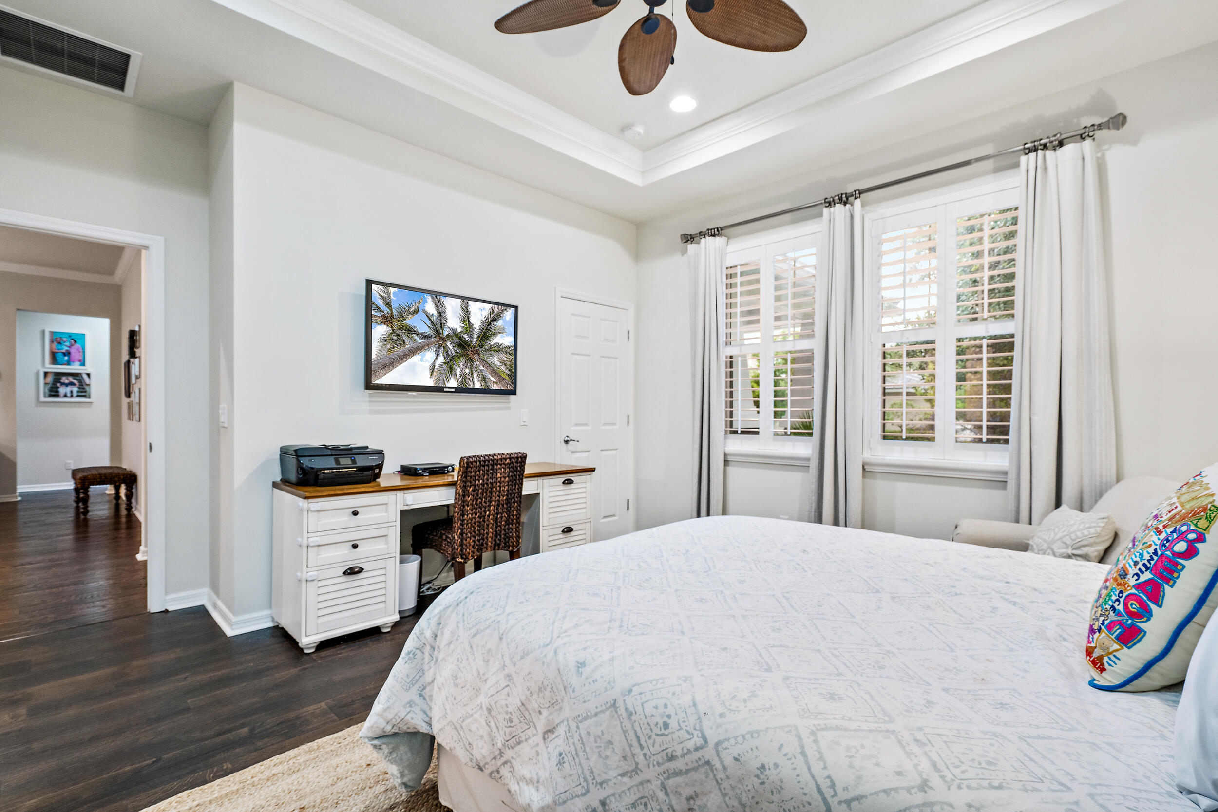 2704 Sunbury Drive Jupiter, FL 33458 - Photo 23 of 50 a spacious bedroom with a bed and a cabinets