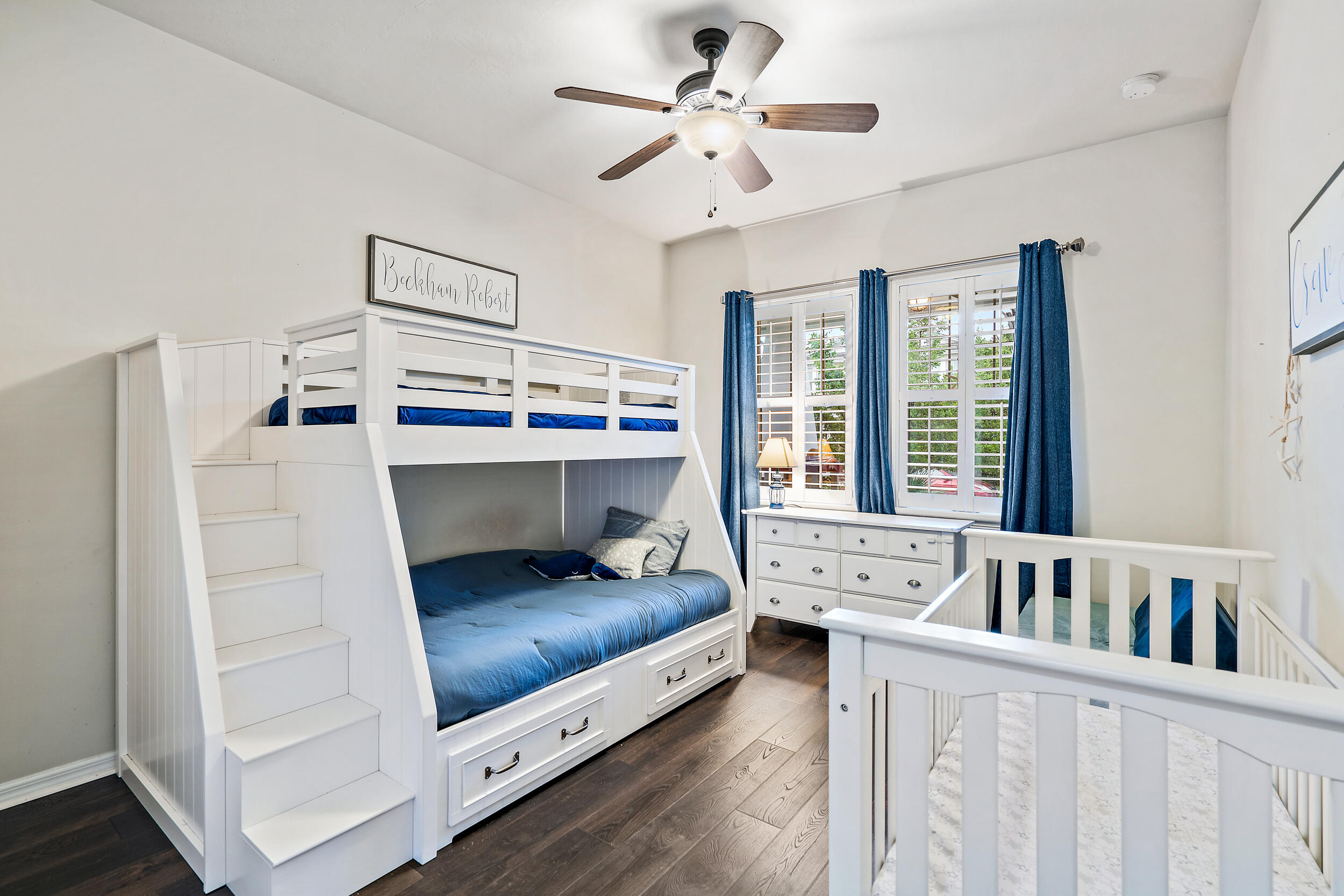 2704 Sunbury Drive Jupiter, FL 33458 - Photo 26 of 50 a bedroom with furniture and a large window