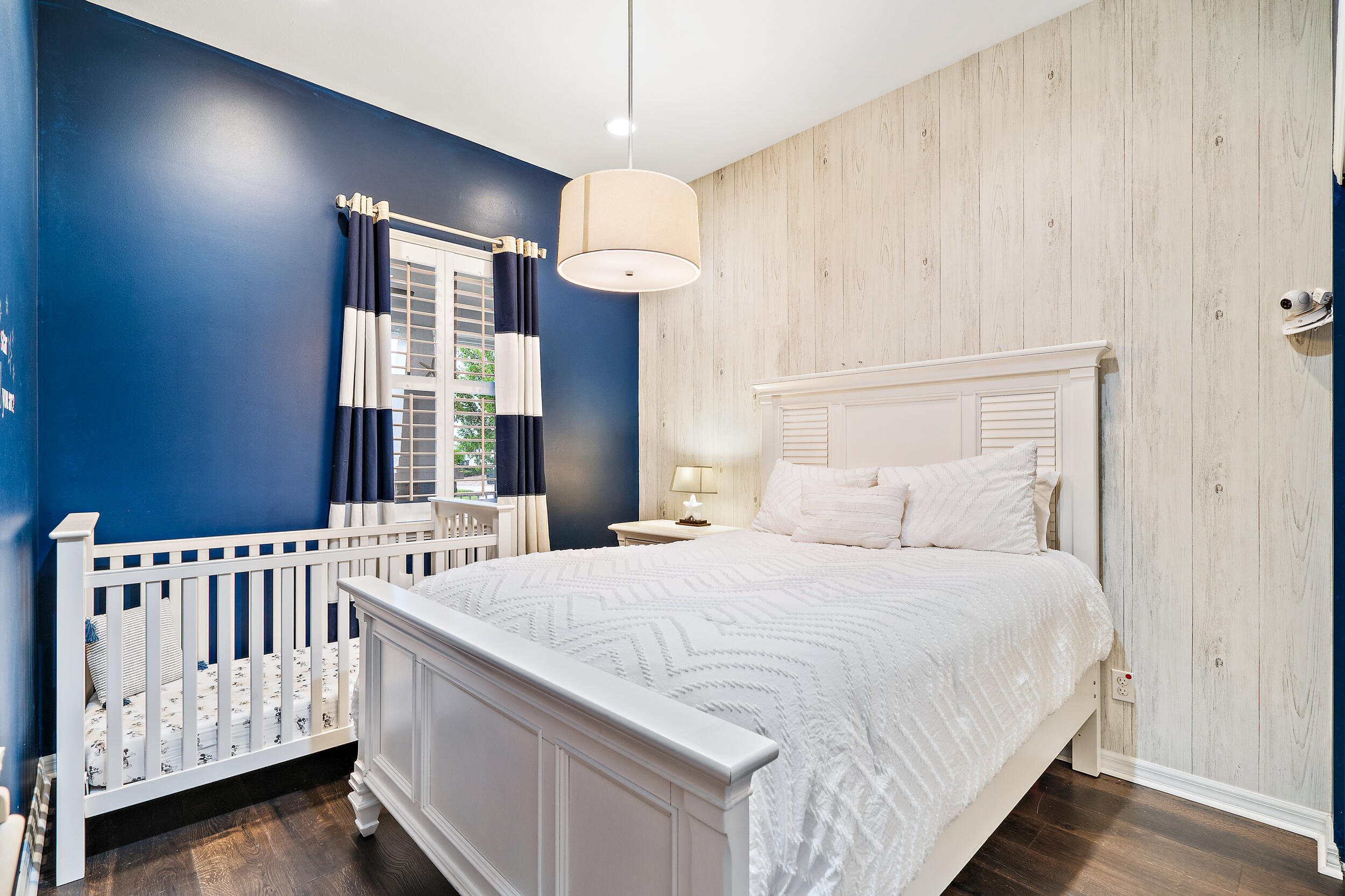 2704 Sunbury Drive Jupiter, FL 33458 - Photo 27 of 50 a bedroom with a bed and a window