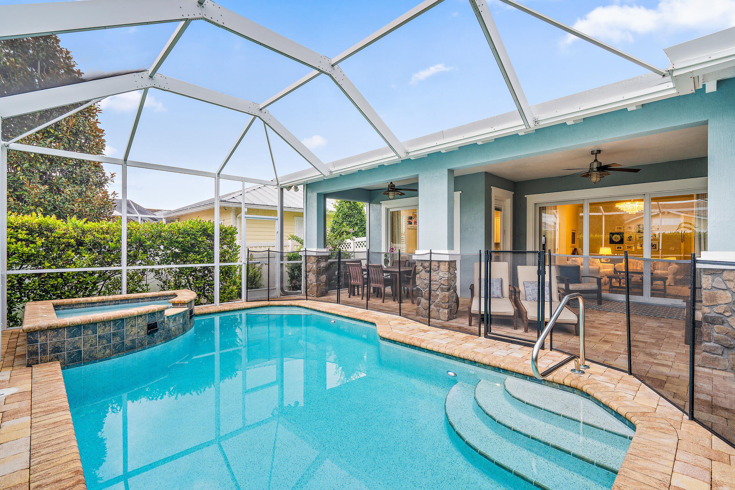 2704 Sunbury Drive Jupiter, FL 33458 - Photo 37 of 50 a view of a swimming pool with a patio