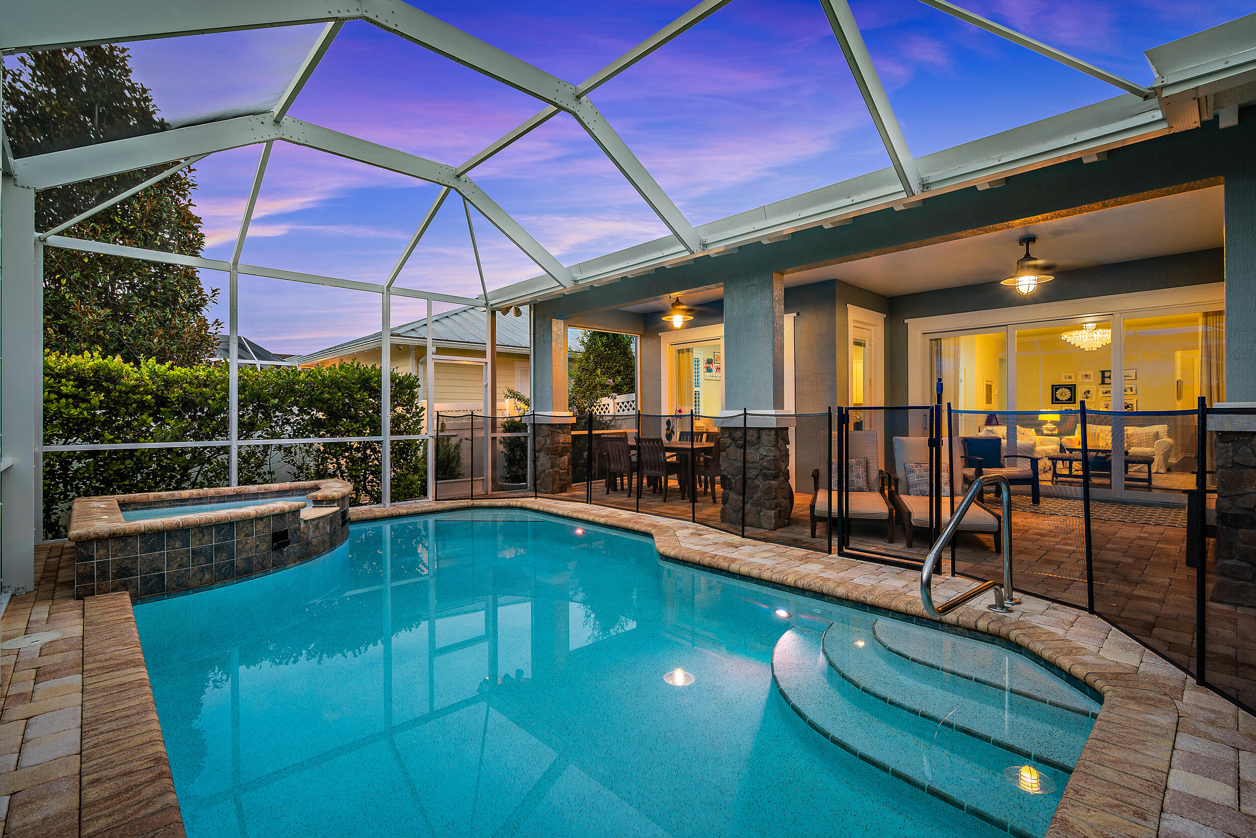 2704 Sunbury Drive Jupiter, FL 33458 - Photo 5 of 50 a view of a swimming pool with a patio