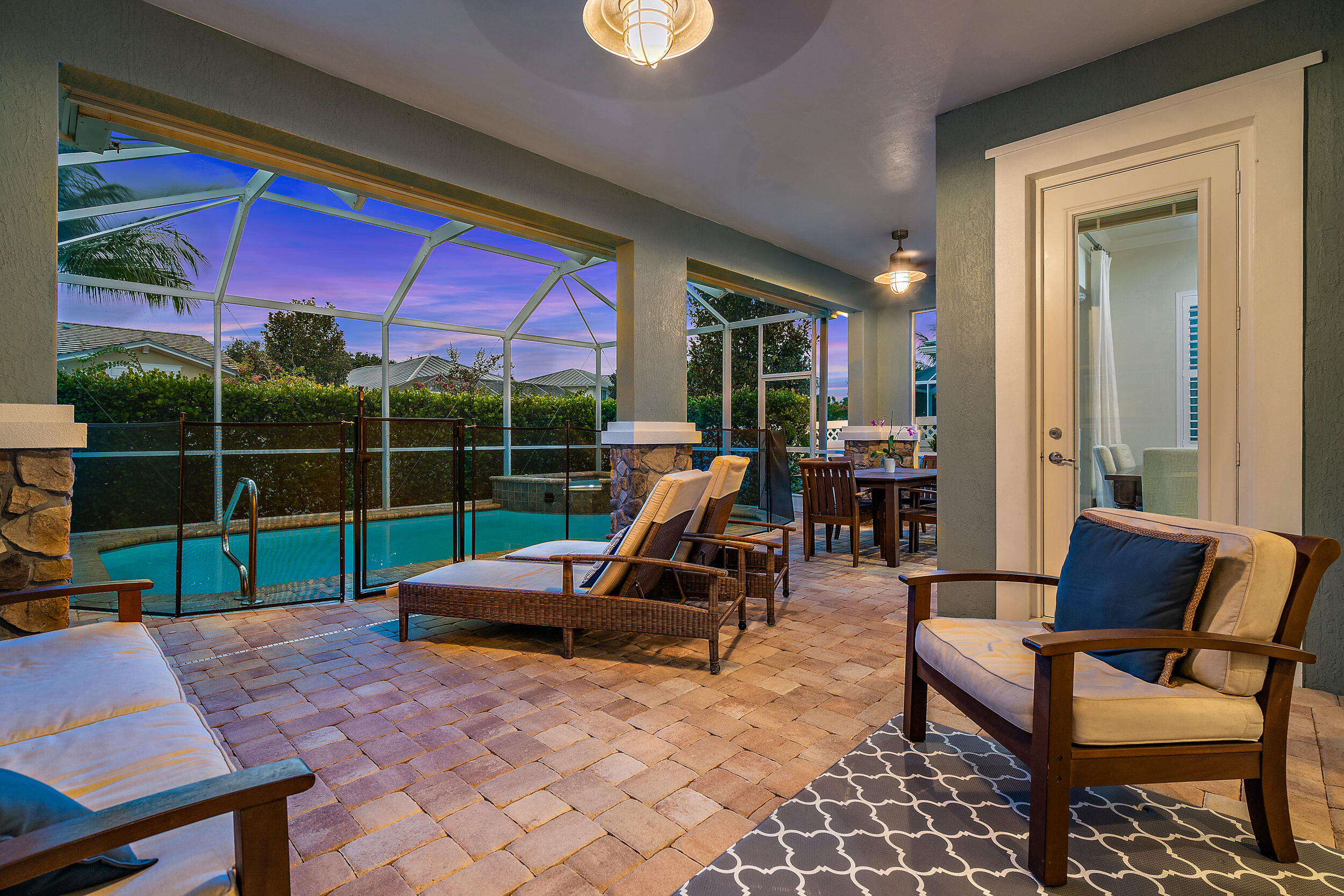 2704 Sunbury Drive Jupiter, FL 33458 - Photo 9 of 50 a living room with furniture a rug and a large window