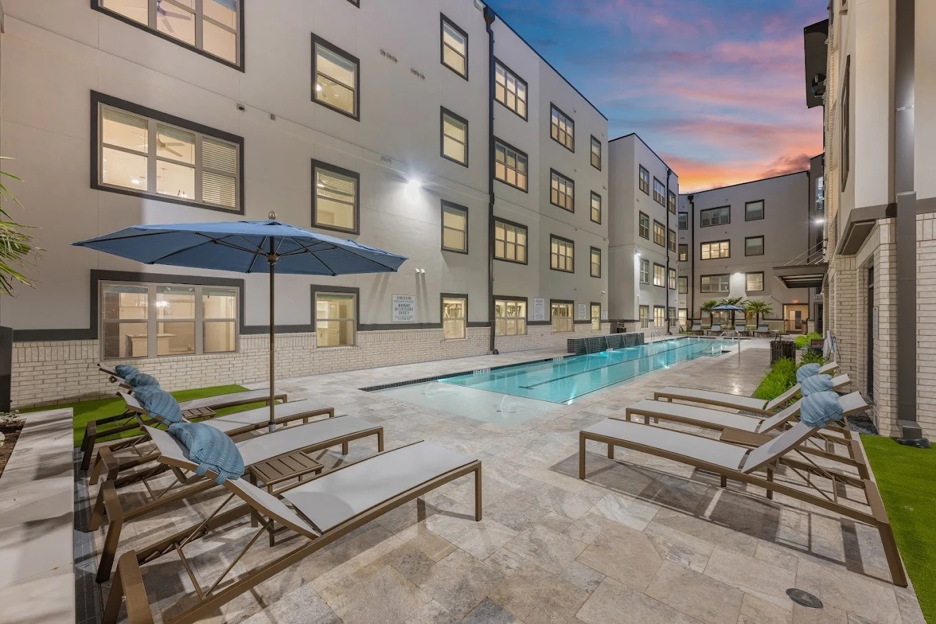 1888 Brittmoore Road, Unit 1453 Houston, TX 77043 - Photo 10 of 16 a view of a patio with a table and chairs