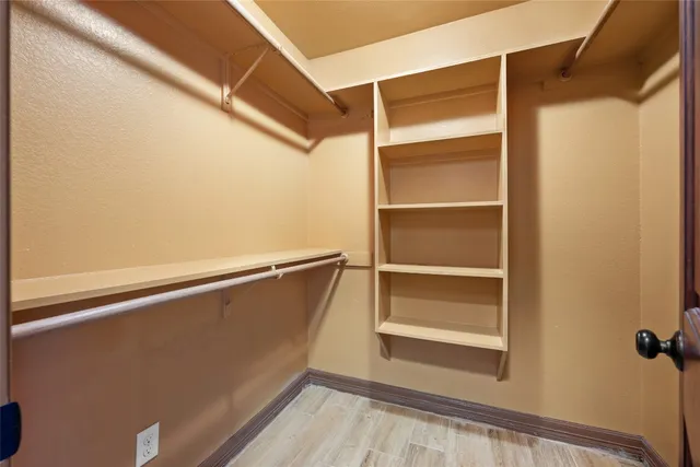 a view of an empty walk in closet