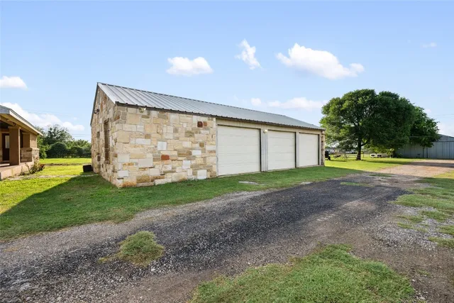 a view of a back yard with a house