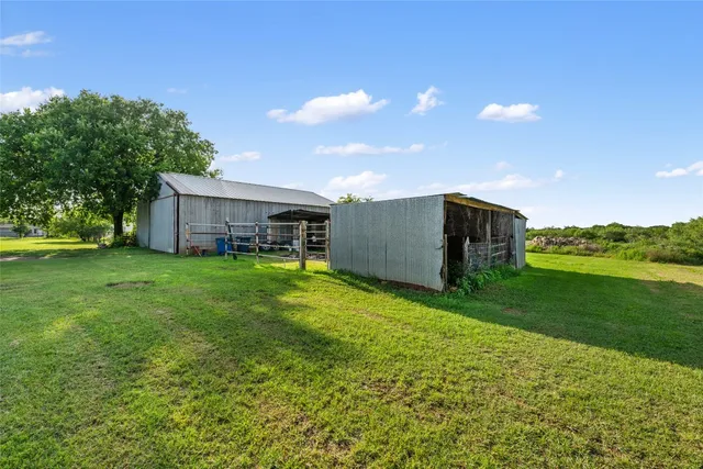 a house view with a garden space