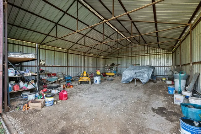 a view of parking garage with cars
