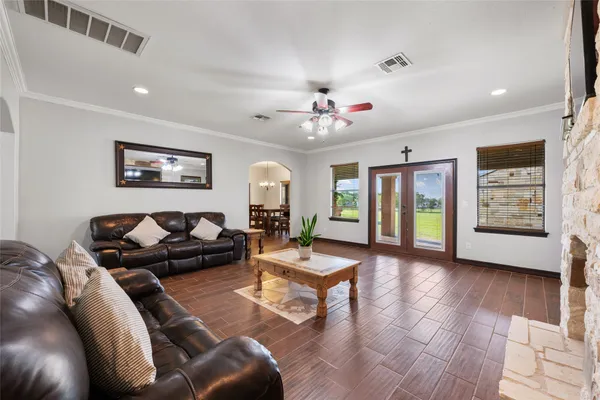 a living room with furniture and window