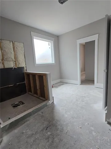 an empty room with windows