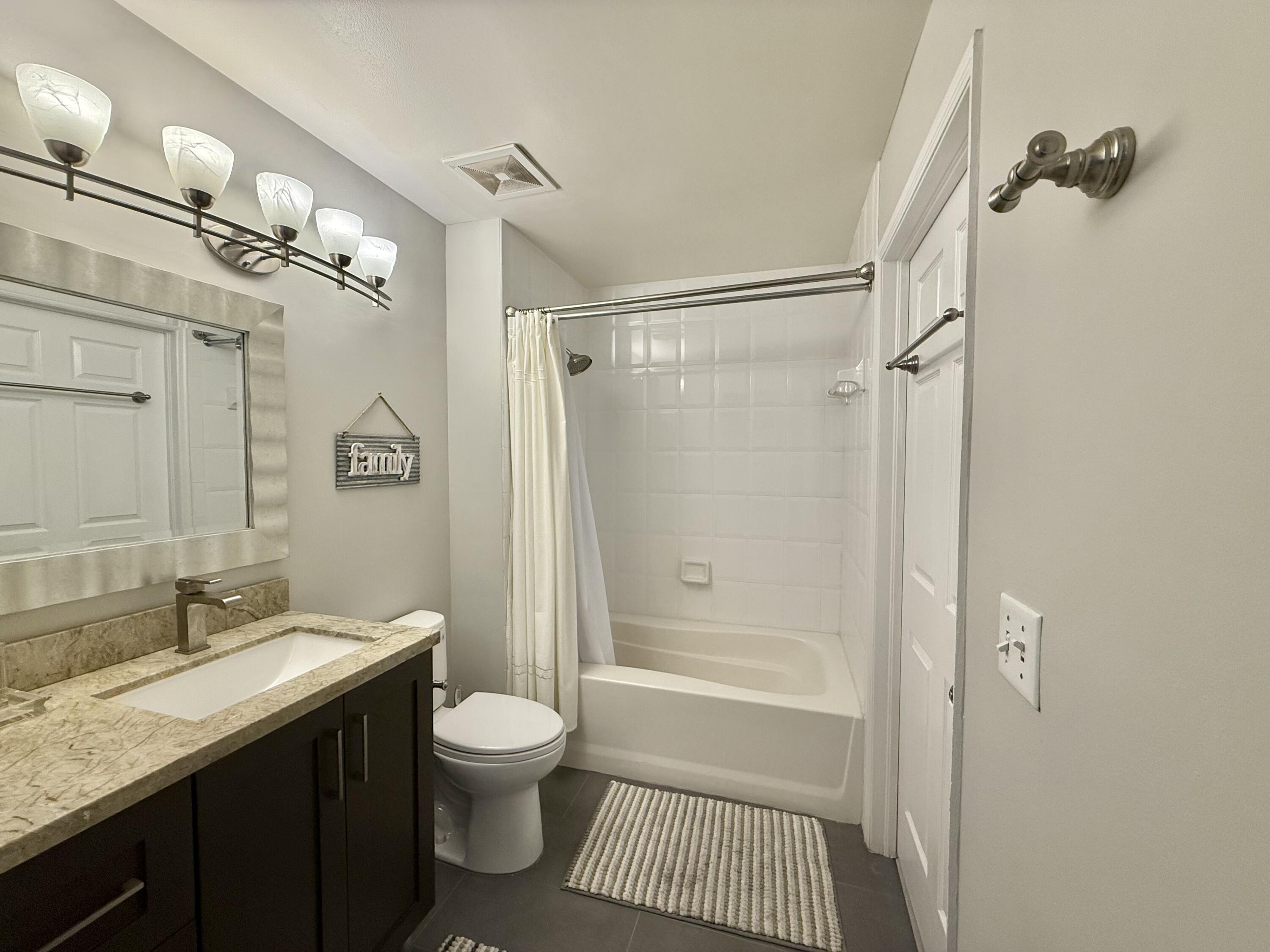 616 Clearwater Park Road, Unit LP01 West Palm Beach, FL 33401 - Photo 23 of 35 MASTER BATH