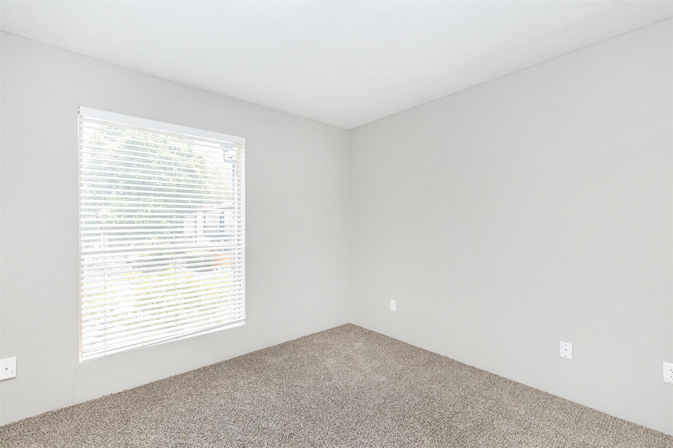 18001 Cypress Trace Road, Unit 503 Houston, TX 77090 - Photo 14 of 32 a view of an empty room with a window