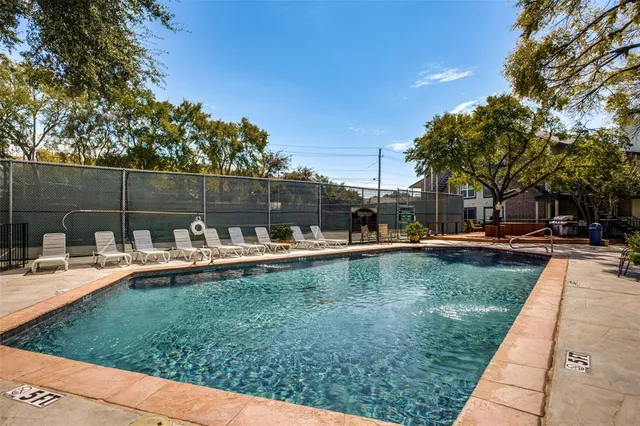 a view of a lake with a yard