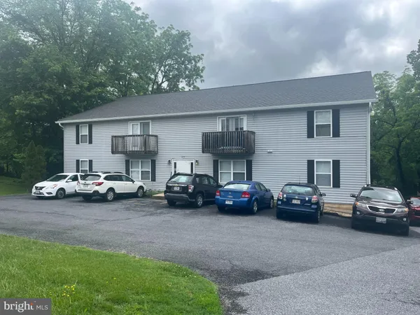 a car parked in front of a house