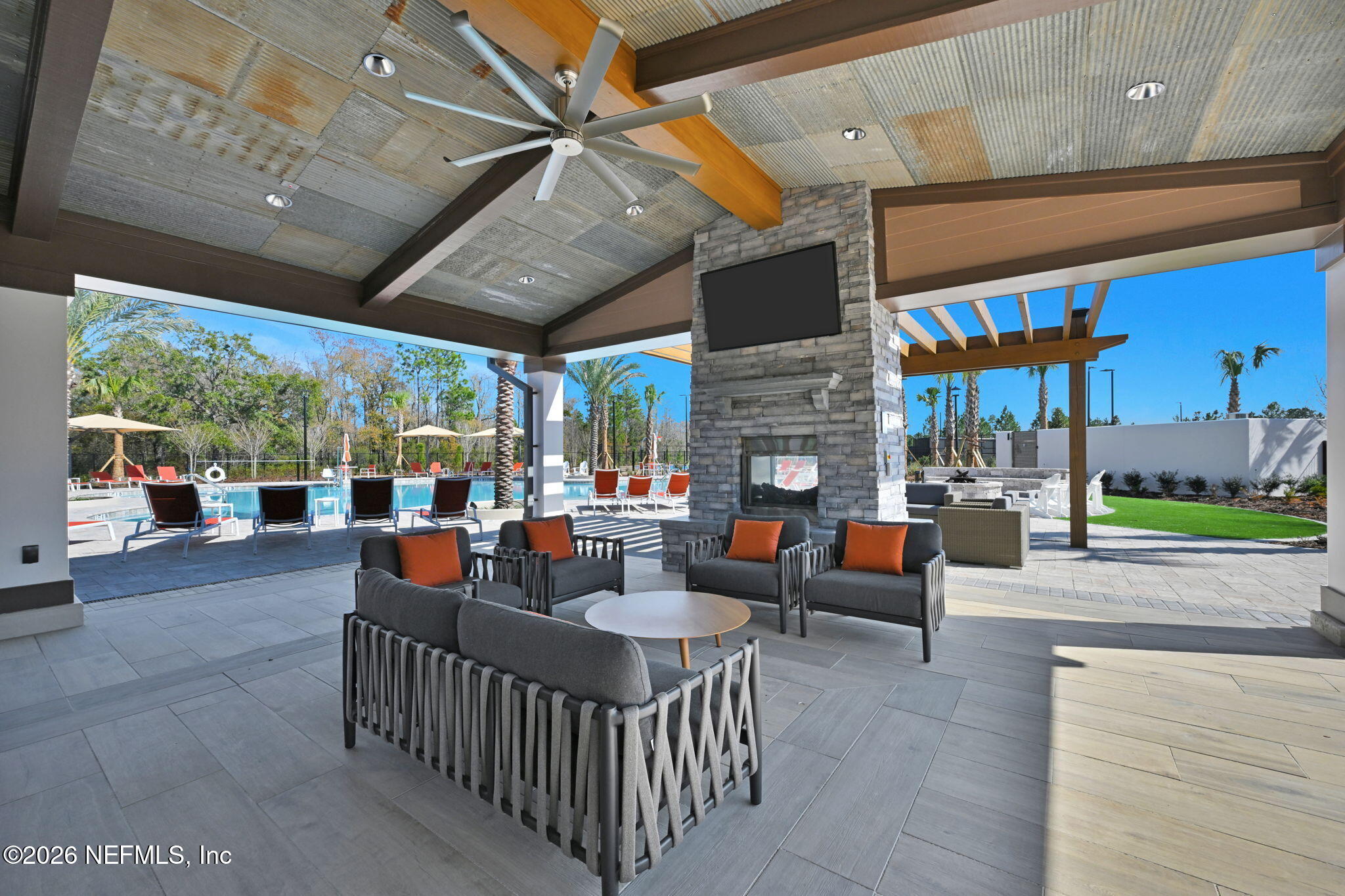 39 Tailhook Trail St. Johns, FL 32259 - Photo 34 of 45 a outdoor space with patio furniture and a fireplace