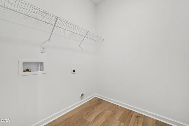 an aerial view of a house with a swimming pool