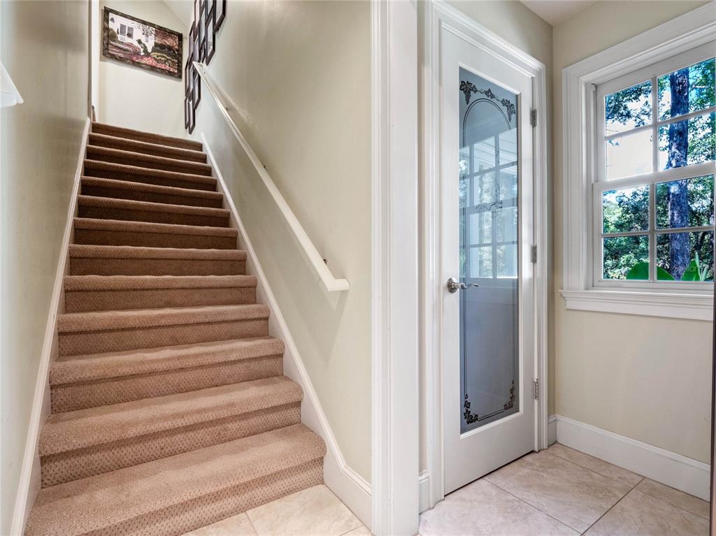 4000 Rouse Road Orlando, FL 32817 - Photo 15 of 53 a view of entryway and hall with wooden floor