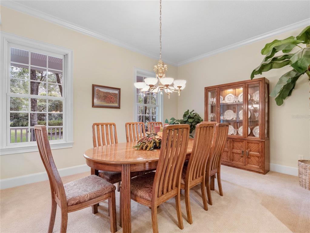 4000 Rouse Road Orlando, FL 32817 - Photo 26 of 53 a view of a dining room with furniture window and outside view