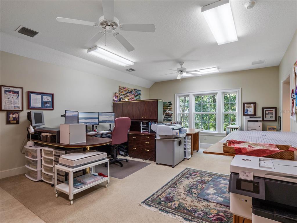 4000 Rouse Road Orlando, FL 32817 - Photo 31 of 53 a living room with furniture and a window