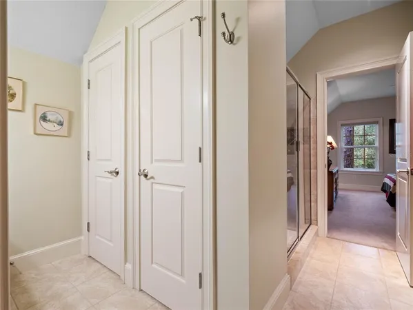 a kitchen with cabinets and window
