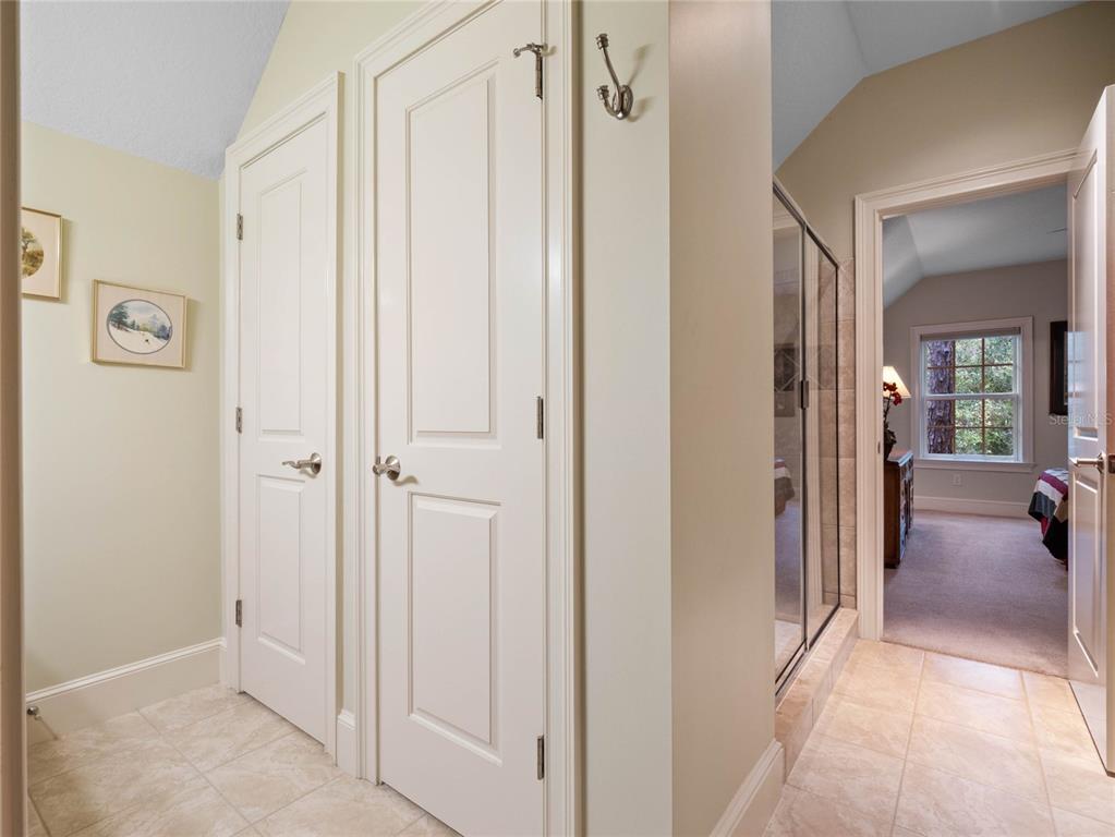 4000 Rouse Road Orlando, FL 32817 - Photo 32 of 53 a view of a hallway with closet and livingroom view