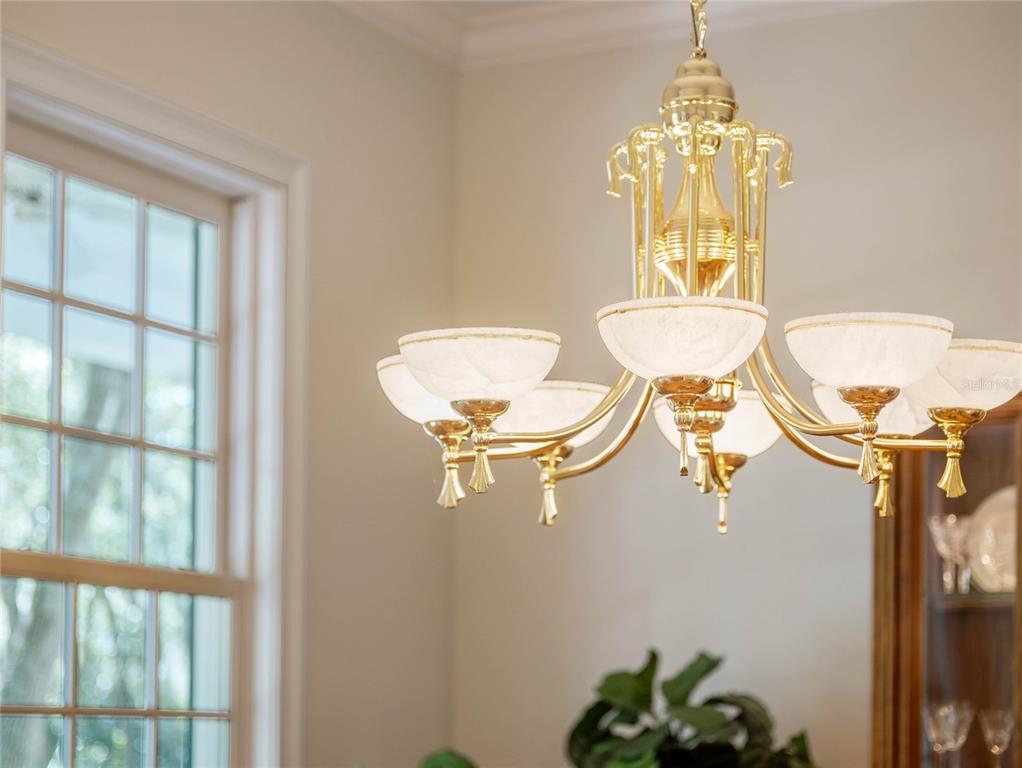 4000 Rouse Road Orlando, FL 32817 - Photo 42 of 53 a bathroom with a toilet a sink and a window